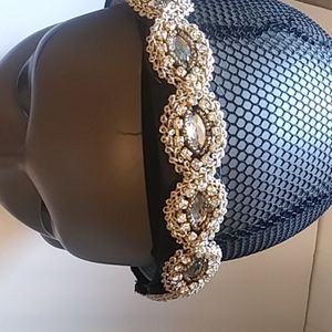 Black headband with gold and clear crystals